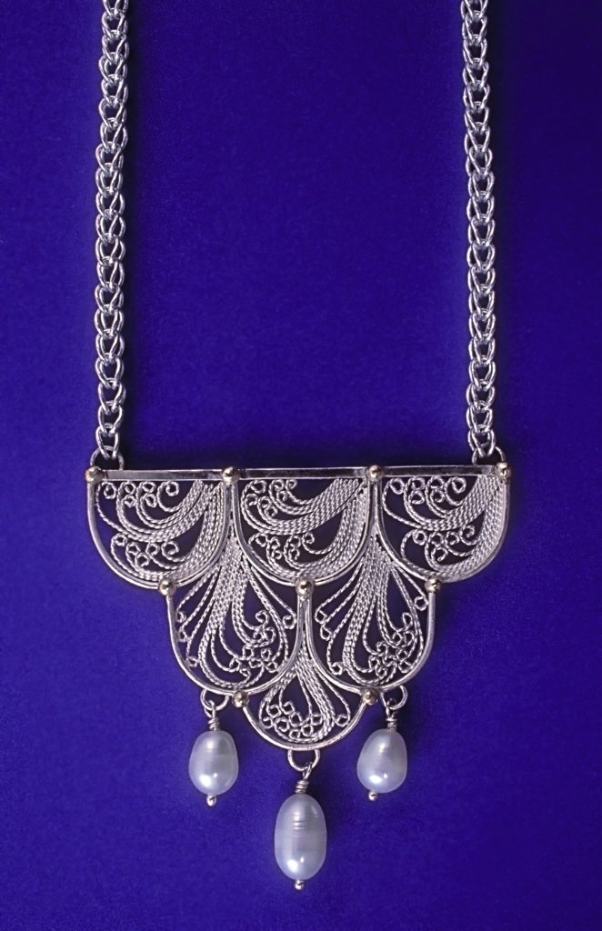 Drip, Russian filigree pendant on a hand woven chain by Victoria Lansford