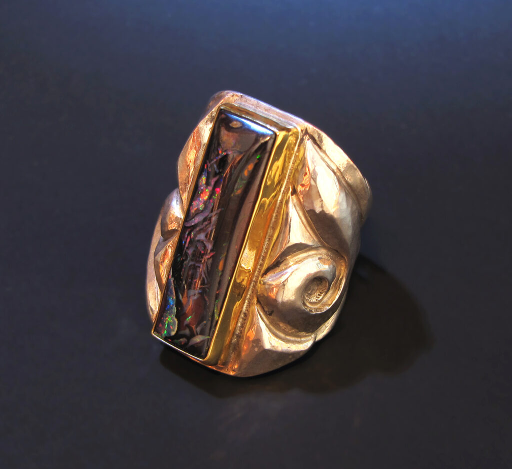 Enveloped II, Eastern repoussรฉ ring, sterling, 22k gold, Koroit opal