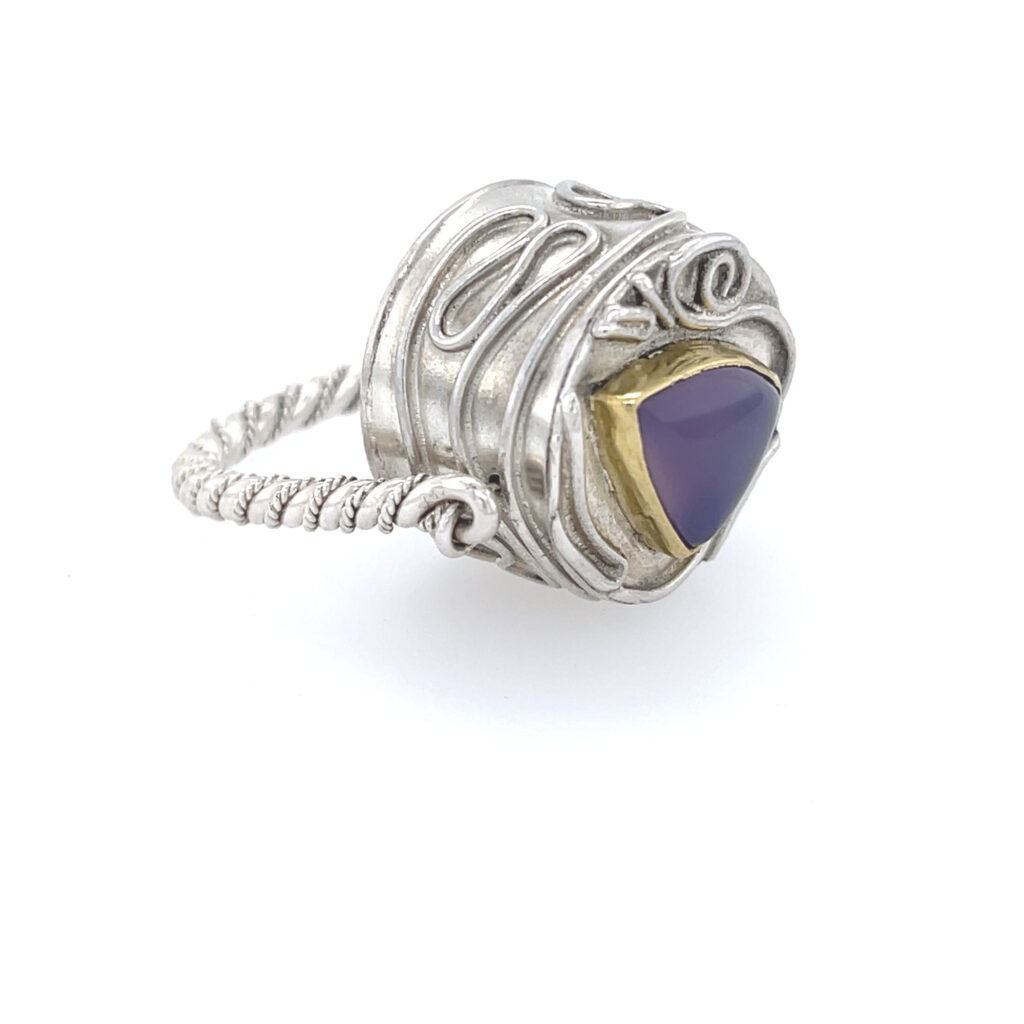 Cake, showing the top and side of the Rotating Bezel Ring