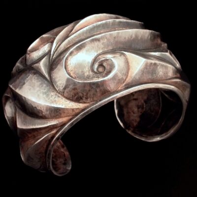 Chased cuff bracelet created using the Eastern repoussé method