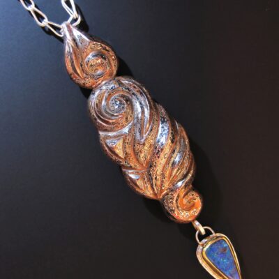 Allahoudine, Eastern repoussé pendant from dimensionally patterned mokume gane, Roman chain, 2012; Sterling, copper, shibuichi, 22k gold, fine silver, Koroit opal