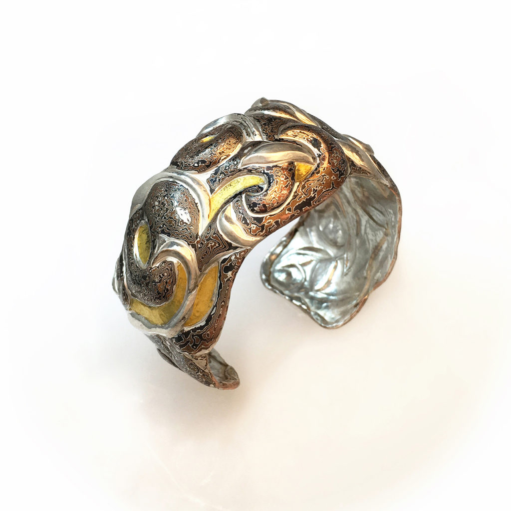 Mysteries Entwined, Eastern repousse patterned mokume gane cuff with kum boo