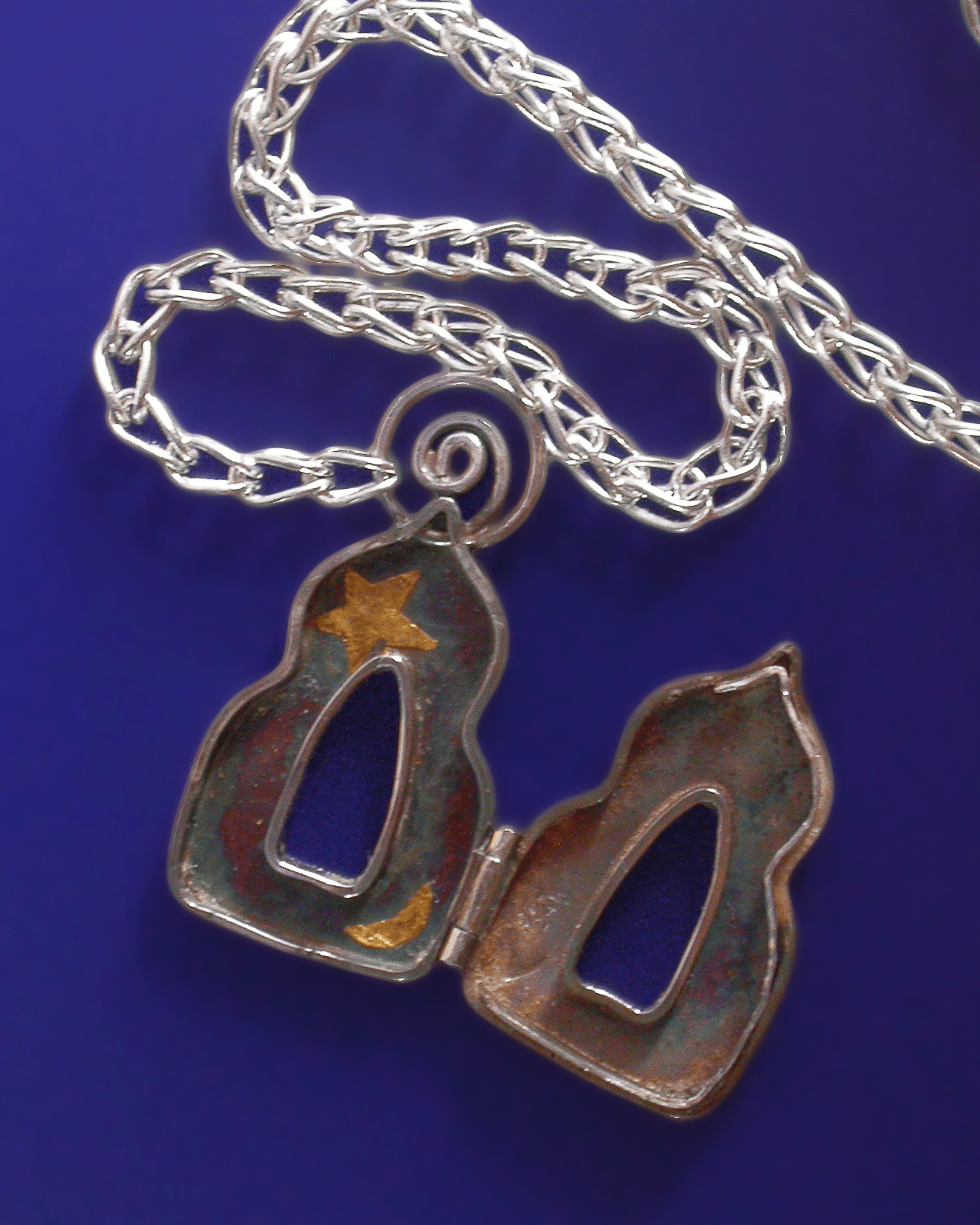 Temple of Love, Chased and keum boo amulet, suspended from a Roman chain; Sterling, fine silver, 24K gold; 1-11/16″ x 7/8″ x 1/4″, 22″ chain