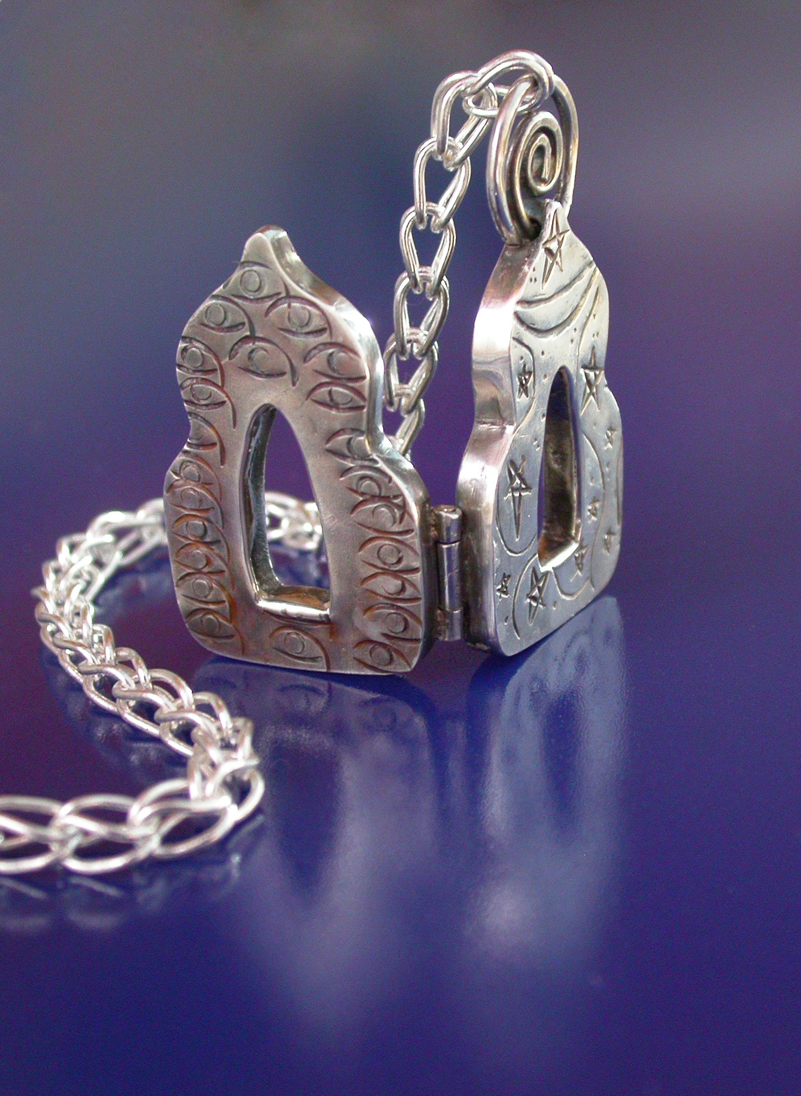 Temple of Love, Chased and keum boo amulet, suspended from a Roman chain; Sterling, fine silver, 24K gold; 1-11/16″ x 7/8″ x 1/4″, 22″ chain