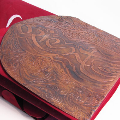 Accordion book on vellum with acid etched copper covers (front)
