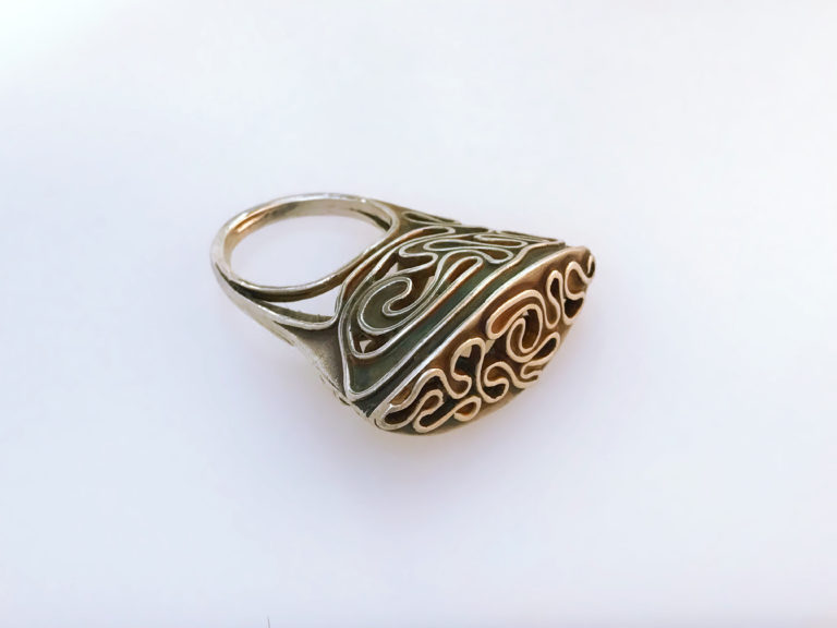 Escape II, ring by Victoria Lansford; photo by Pat Vasquez-Cunningham
