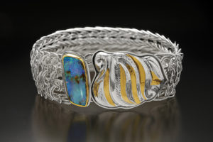 Indira, from the Transformation Collection: Side Weave Mesh chain bracelet with a clasp of Eastern repousse and kum boo by Victoria Lansford; photo by Pat Vasquez-Cunningham
