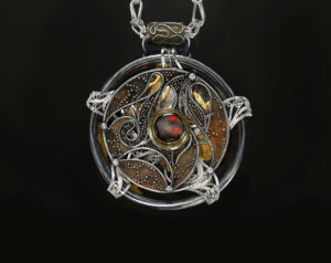Relativity Navigator, Rotating Russian filigree, chased, granulation, and gilt pendant on a Roman chain by Victoria Lansford; photo by Pat Vasquez-Cunningham
