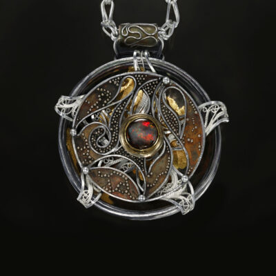 Relativity Navigator, Rotating Russian filigree, chased, granulation, and gilt pendant on a Roman chain by Victoria Lansford; photo by Pat Vasquez-Cunningham