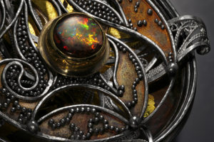 Relativity Navigator (detail), Rotating Russian filigree, chased, granulation, and gilt pendant on a Roman chain by Victoria Lansford; photo by Pat Vasquez-Cunningham