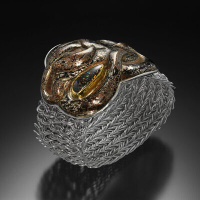 Circe’s Revenge II, Eastern repousse, mokume gane, and Side Weave Mesh bracelet by Victoria Lansford; photo by Pat Vasquez-Cunningham