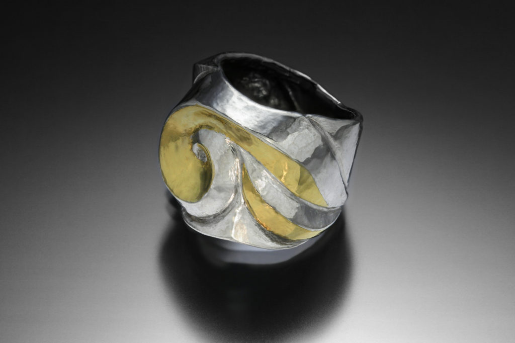 Enveloped, Eastern repousse ring by Victoria Lansford; photo by Pat Vasquez-Cunningham