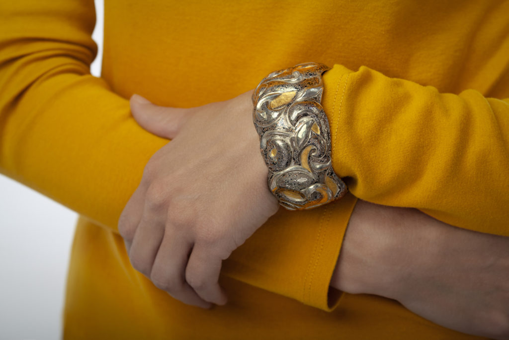 Mysteries Entwined, Eastern repousse cuff by Victoria Lansford; photo by Pat Vasquez-Cunningham