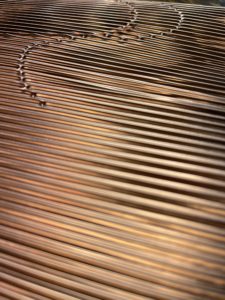 Corrugated and smocked metal panel in progress  - Victoria Lansford