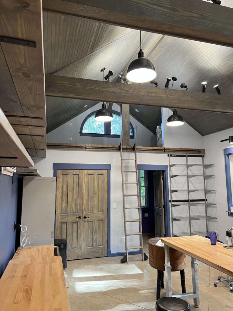 The loft and glazing area of the pottery studio
