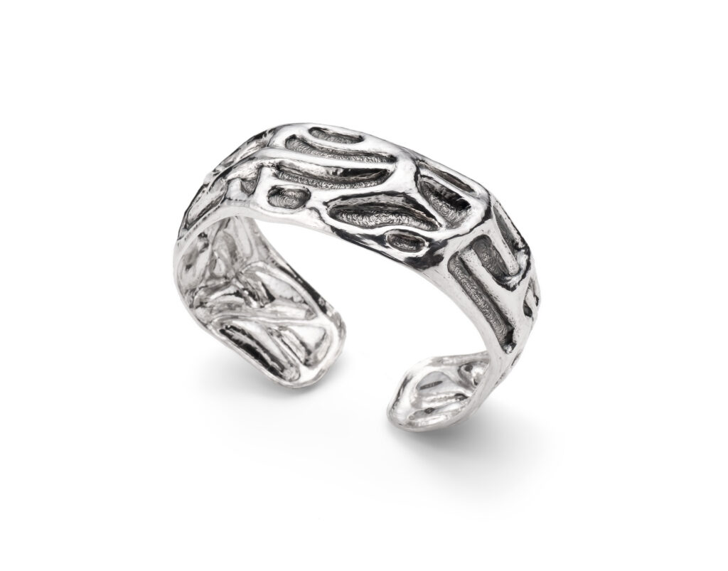 from the series, Heart on Your Sleeve, Eastern repousse cuff bracelet by Stuart Griffiths