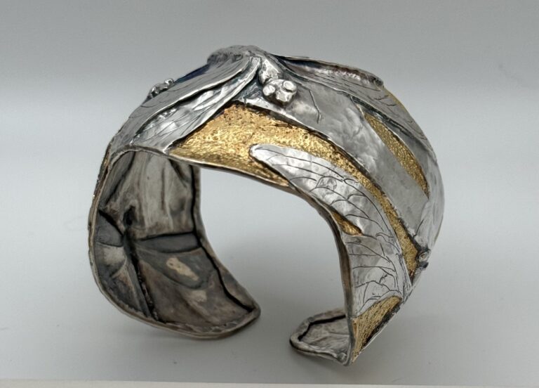 Unique chased cuff bracelet featuring the artistry of Eastern repoussé by Judi Schwartz
