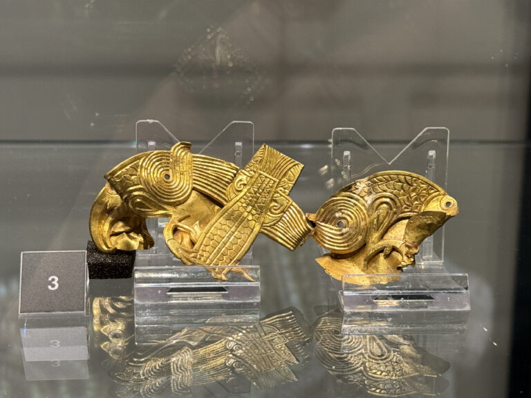 Gold mount showing a bird catching a fish. It may have decorated a high-status saddle. The relief work, countersunk and plateaued areas of the legs (teardrop shapes), sharp ridges in the spirals, and chased textures were done with similar tools and the same steps I teach in Eastern repoussé.