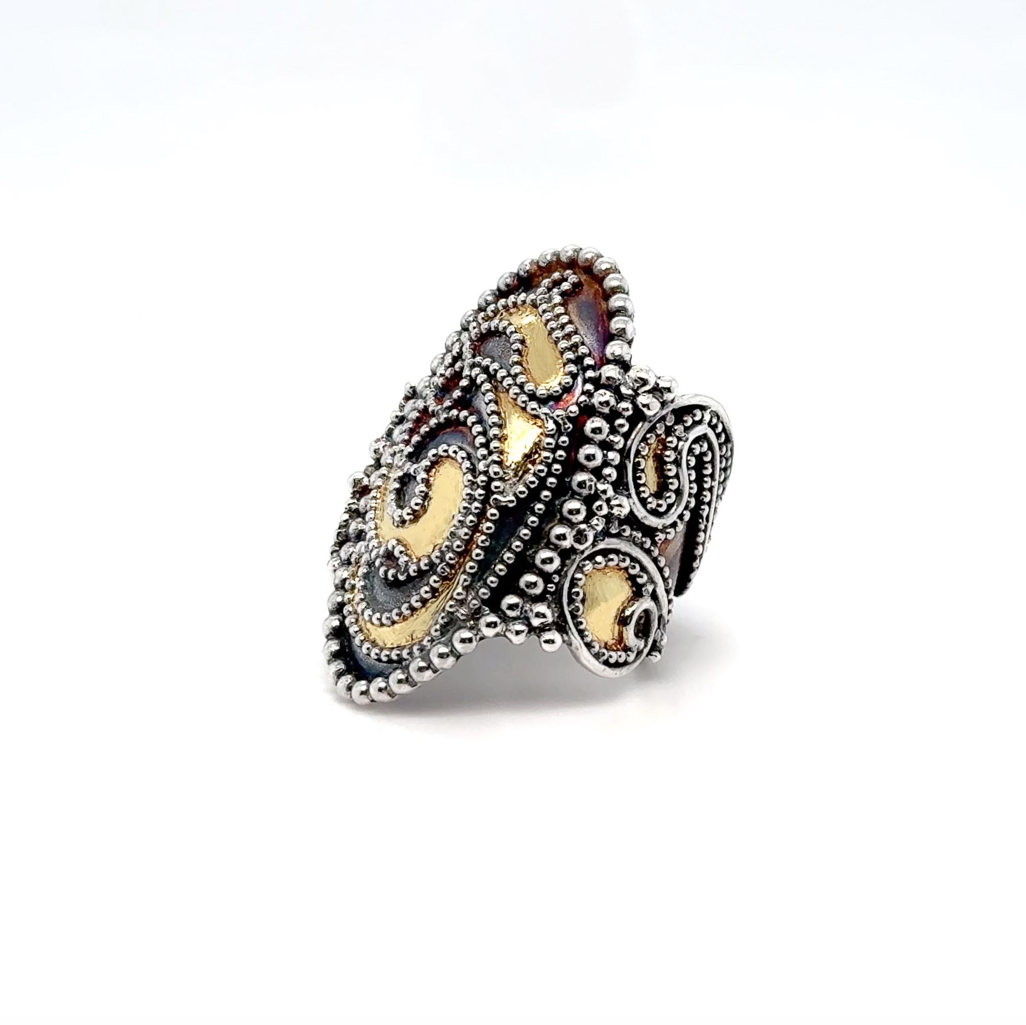 An artistic portrayal of a contemporary ring adorned with exquisite granulation and keum boo techniques, highlighting the fusion of ancient craftsmanship with modern design