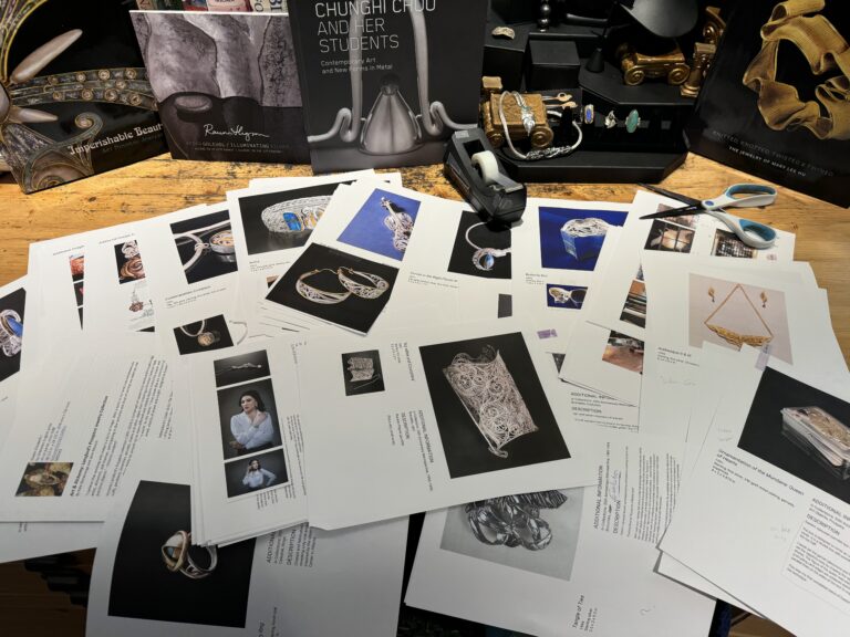 Radiant Echoes - Portfolio and essay print-outs serving as my visual "cut and paste" for ordering the pieces in the exhibition
