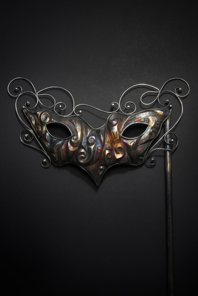 "Lost in a Masquerade" Eastern repousse and scrollwork mask, inspired by Venetian Carnival masks and the song of the same title by jazz guitarist George Benson