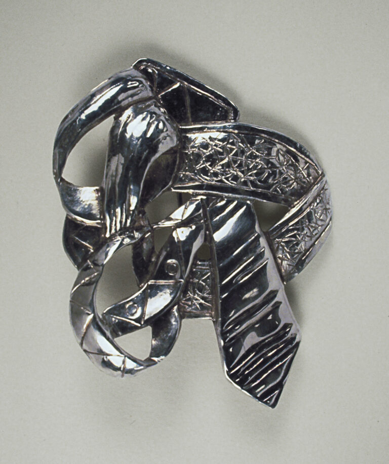 Tangle of Ties, Eastern repoussé brooch, commissioned by and based on a painting by Kevin Cole