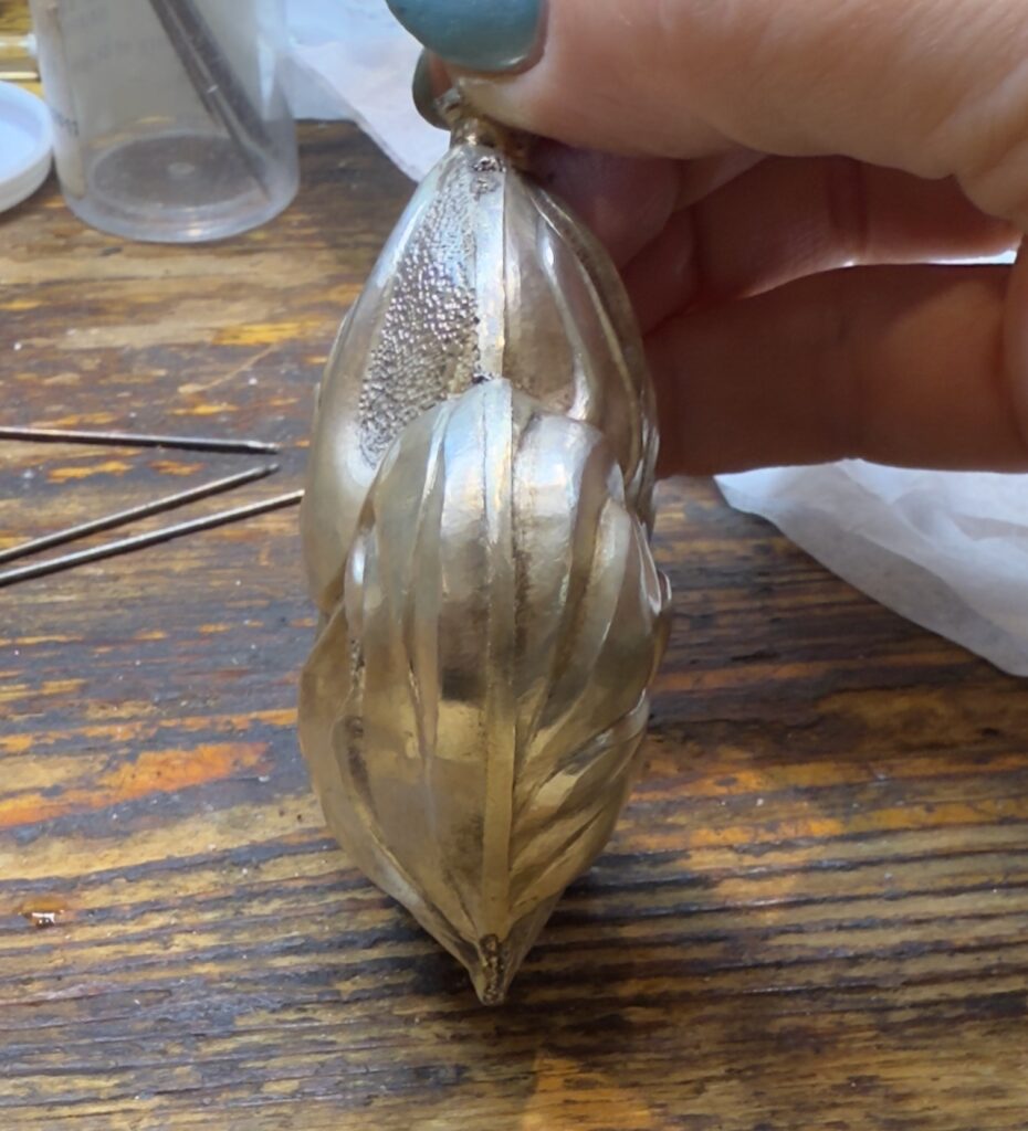Femina, perfume bottle in progress with the neck soldered in place (side view)