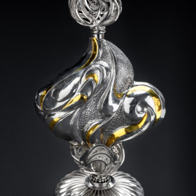 Femina, mirror-formed Eastern repoussé and keum boo bottle with 3D filigree and micro-formed stopper and stand, 2026 Sterling, fin silver, 24k gold; 4 x 2.75 x 1.75 in; photo by Pat Vasquez-Cunningham